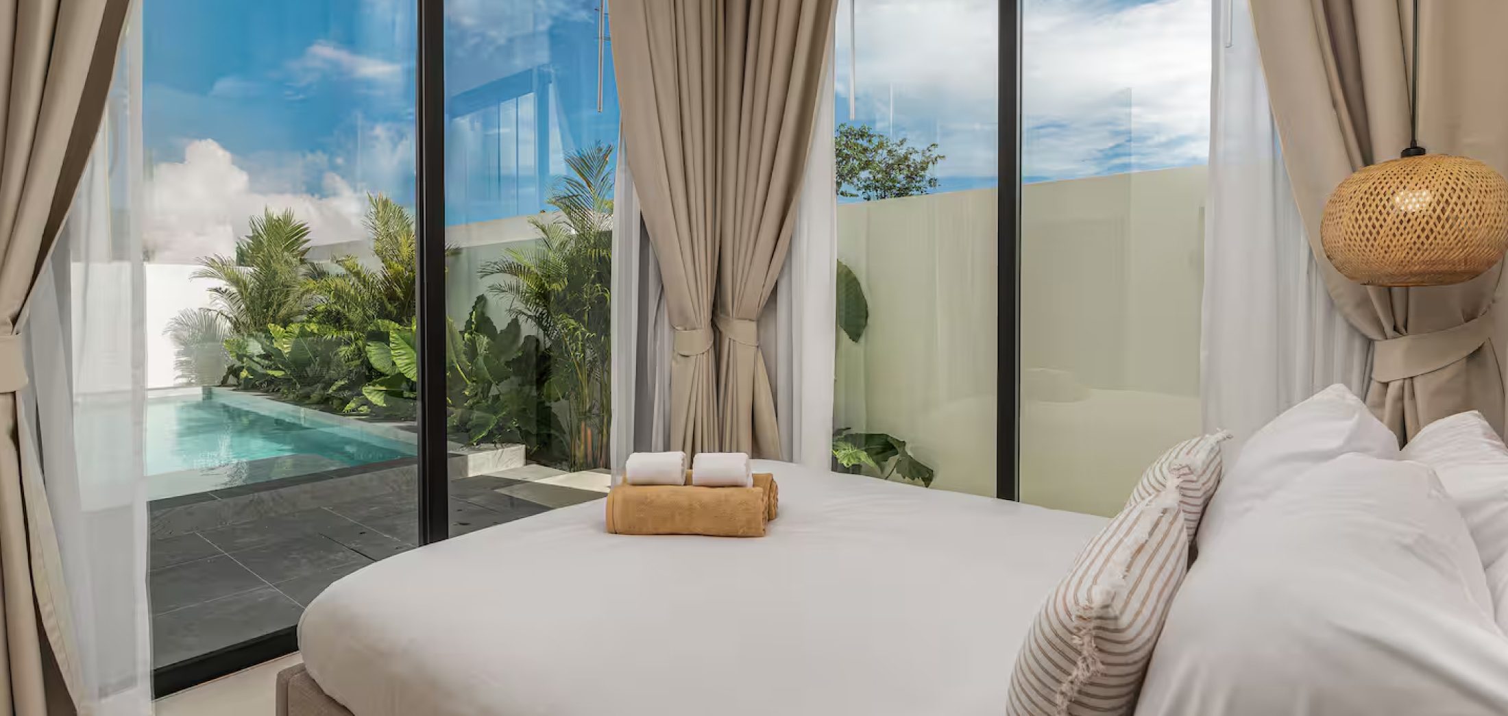 Bedroom view of private pool at Sunrise Garden Bangtao Phuket