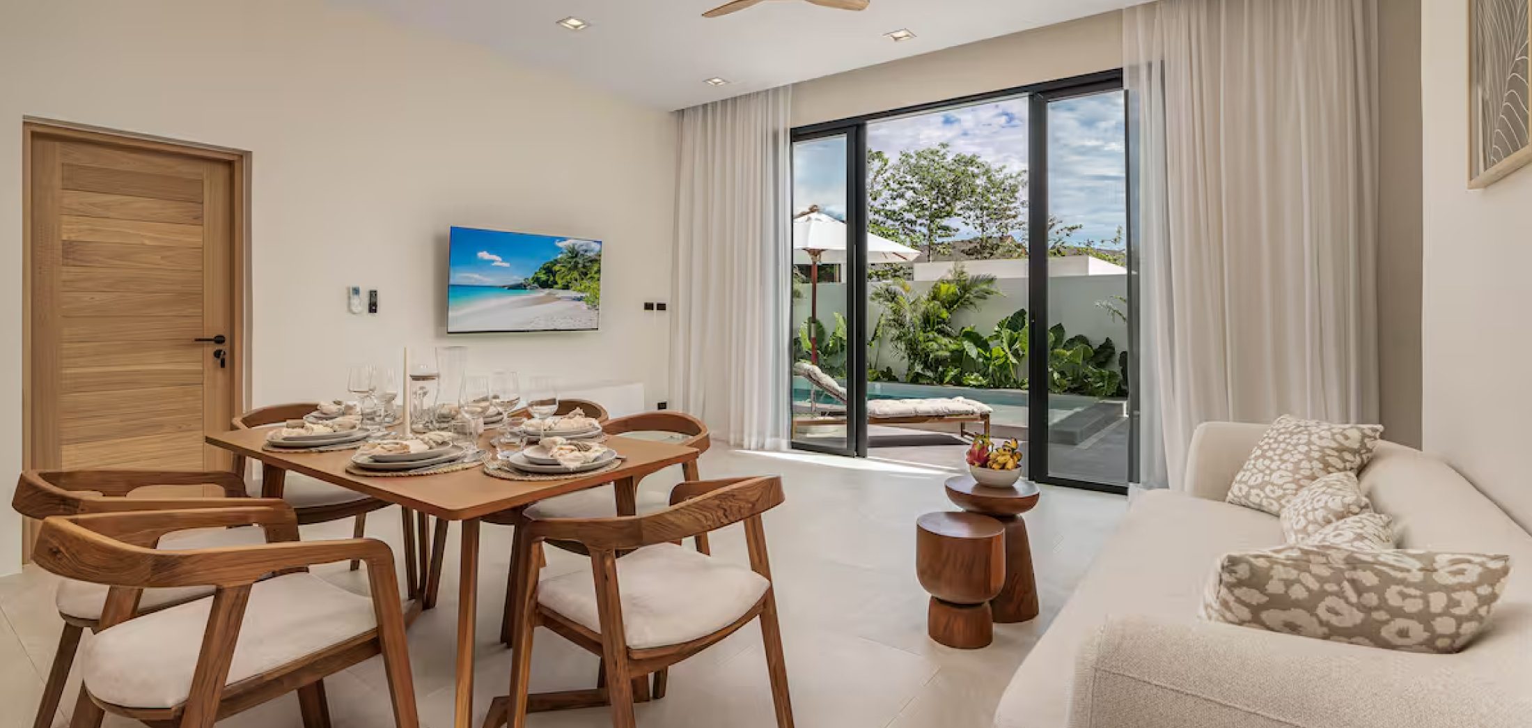 Dining area with pool view at Sunrise Garden Bangtao Phuket