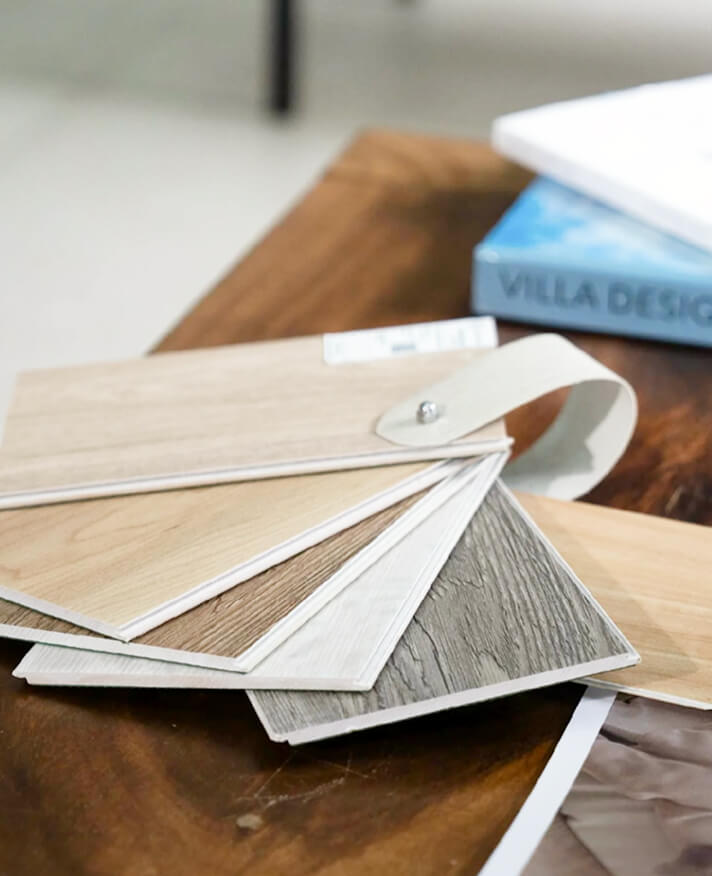 Material samples for luxury villa developer Thailand showcasing textures.